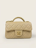Chanel Small Flap Bag with Top Handle – Beige Quilted Caviar Leather