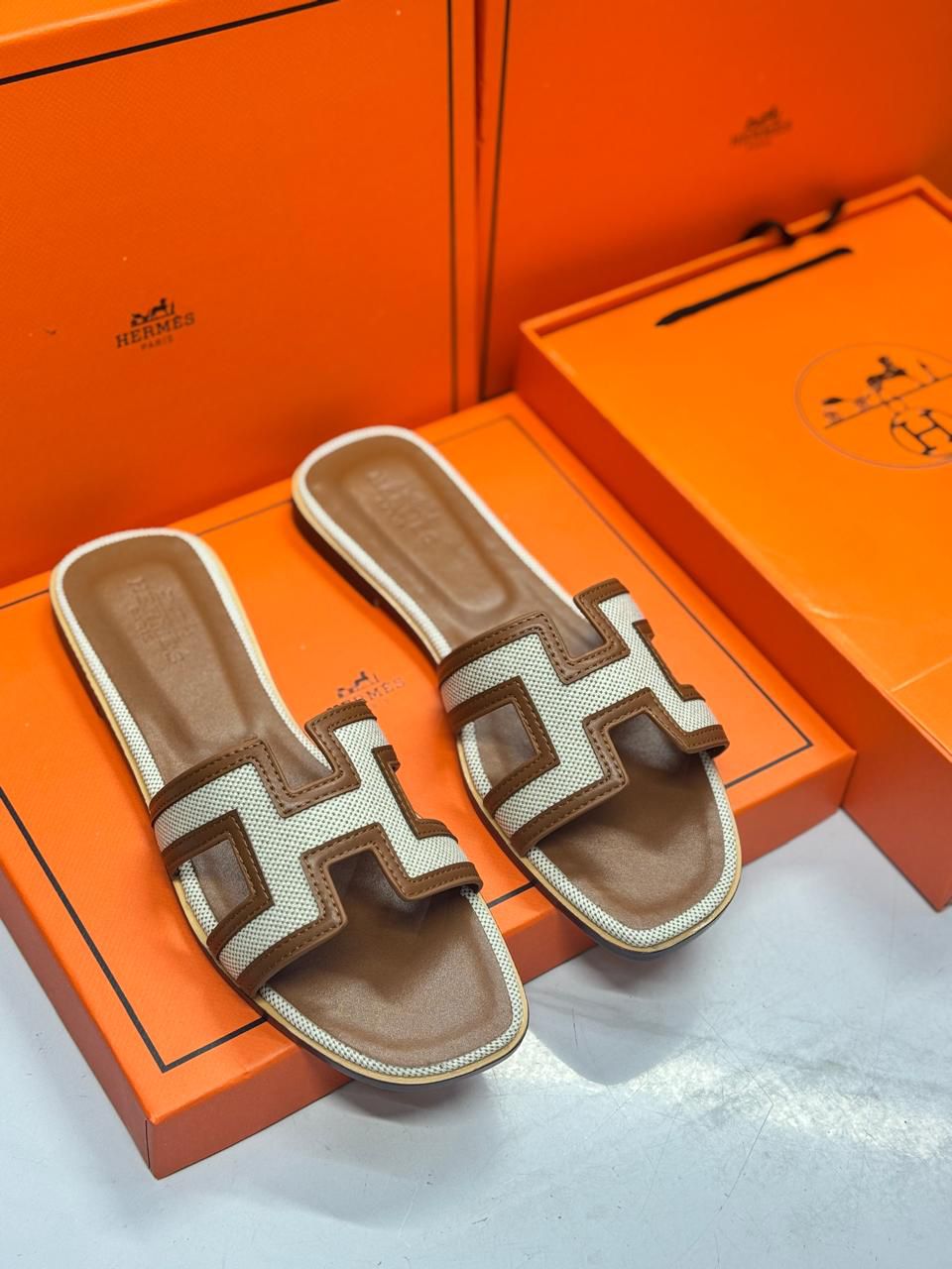 Hermès Oran Sandals – Iconic Elegance in Canvas & Leather