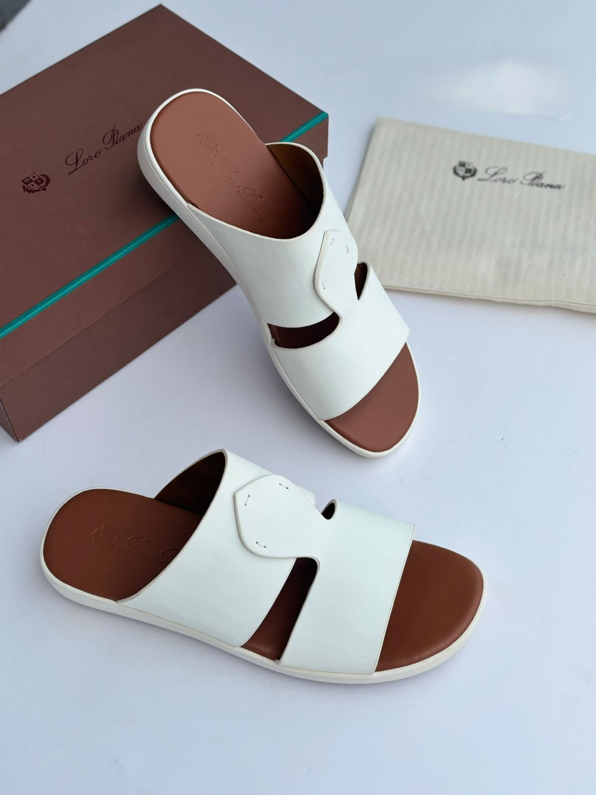 Loro Piana Leather Cutout Slide Sandals in Cream and Cognac
