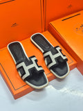 Hermès Oran Sandals – Monochrome Canvas & Black Leather