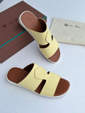 Loro Piana Leather Cutout Slide Sandals in Butter Yellow and Cognac