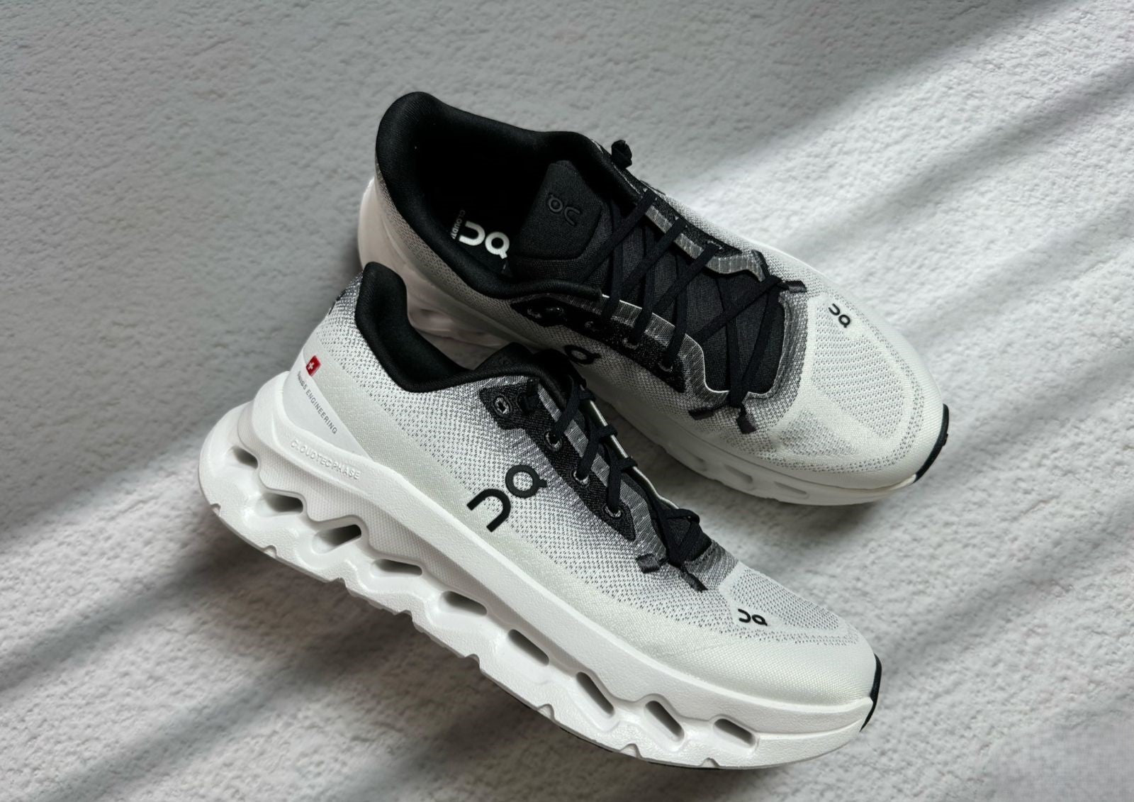 On Cloudtilt "White/Black" | Precision Engineering & Style